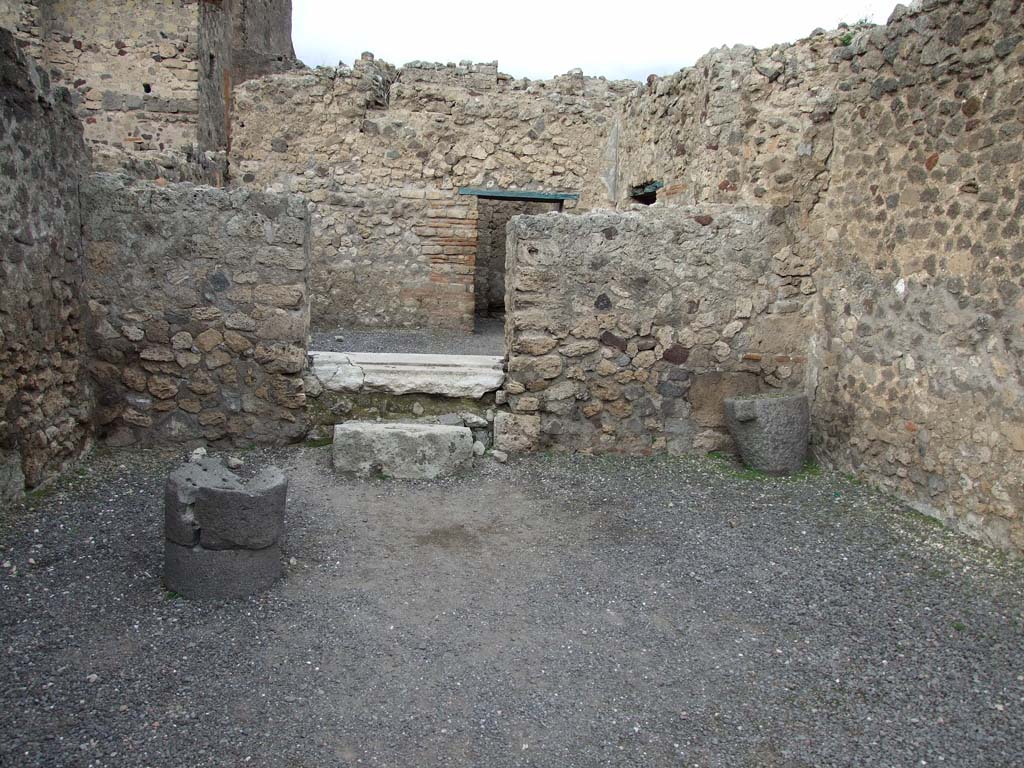 VI.8.9 Pompeii. December 2007. Two steps leading to rear rooms.