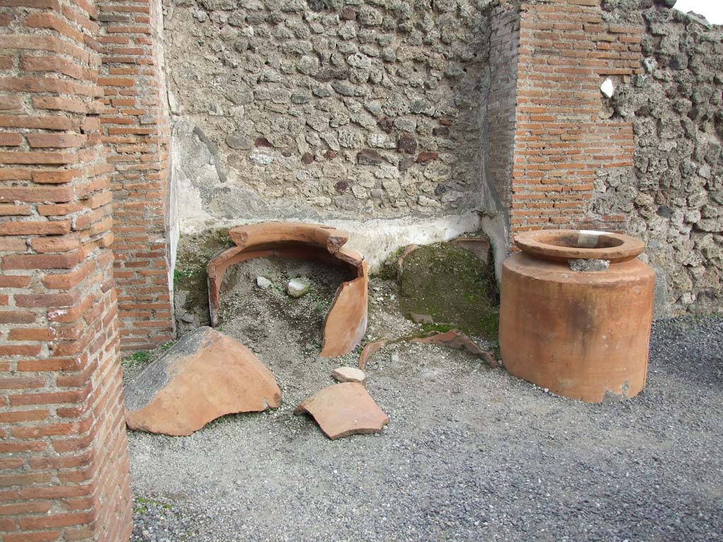 VI.8.9 Pompeii. May 2010. Looking north into rear room, reached by two steps. The door, with blue gates, would have linked to VI.8.13.
