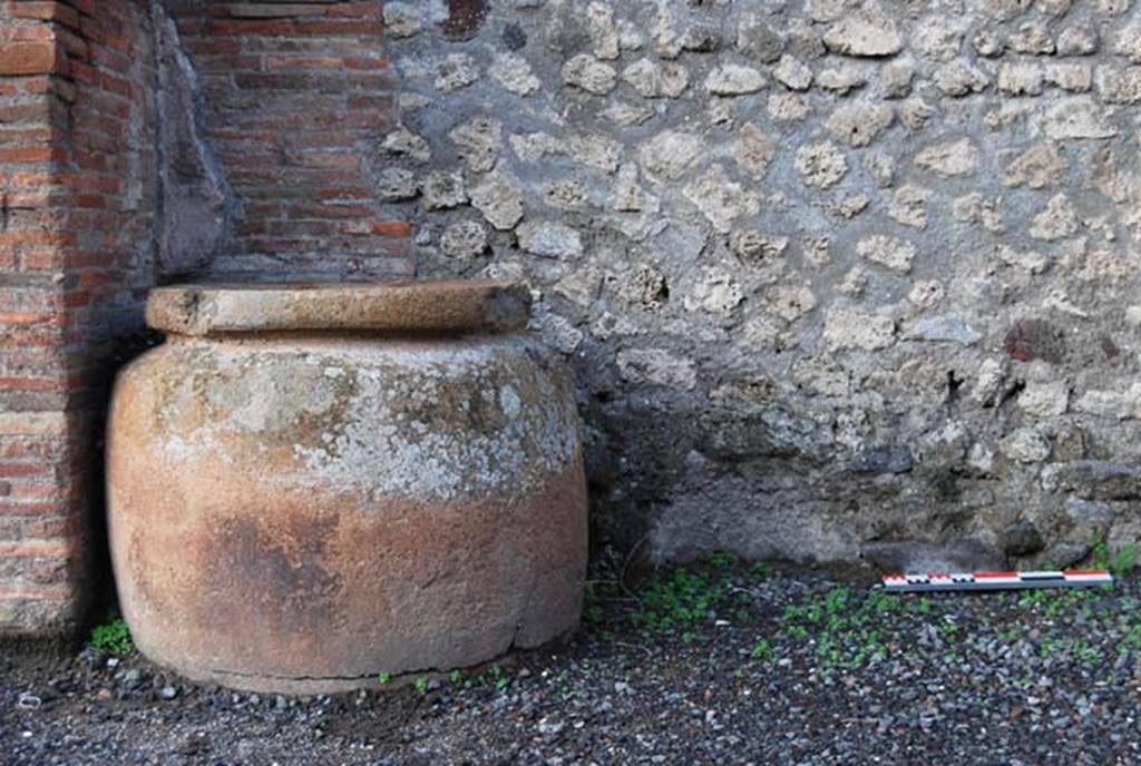 VI.8.11 Pompeii. November 2009. Dolium near west wall. Photo courtesy of Nicolas Monteix.