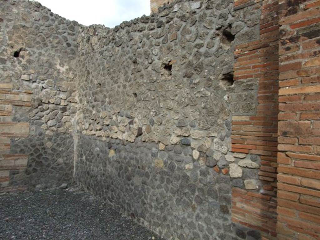 VI.8.11 Pompeii. December 2007. East wall of shop.