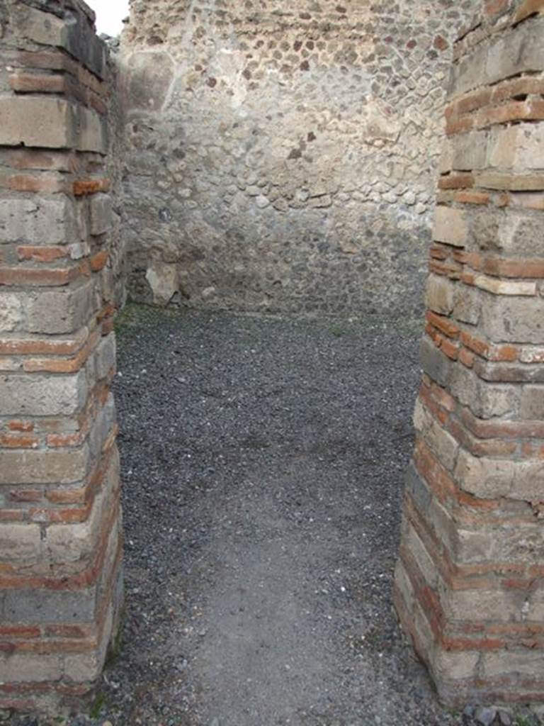 VI.8.11 Pompeii. December 2007. Doorway to rear room in north wall of shop.