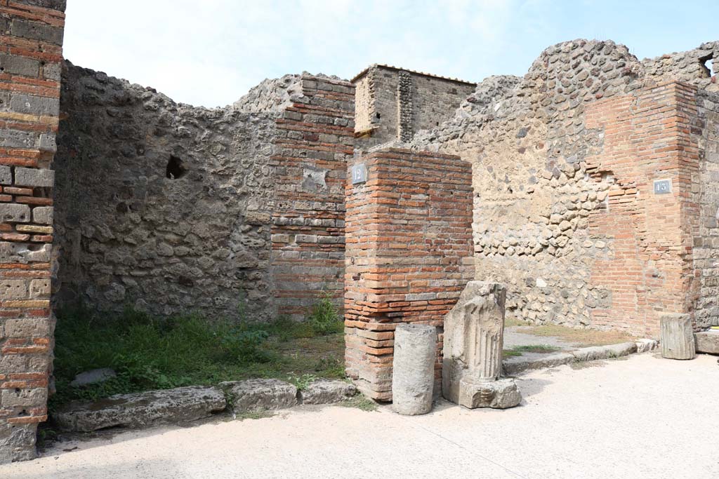 VI.8.12 Pompeii, on left. December 2018. 
Looking towards entrance doorways on west side of Via di Mercurio, with VI.8.13, on right. Photo courtesy of Aude Durand.
