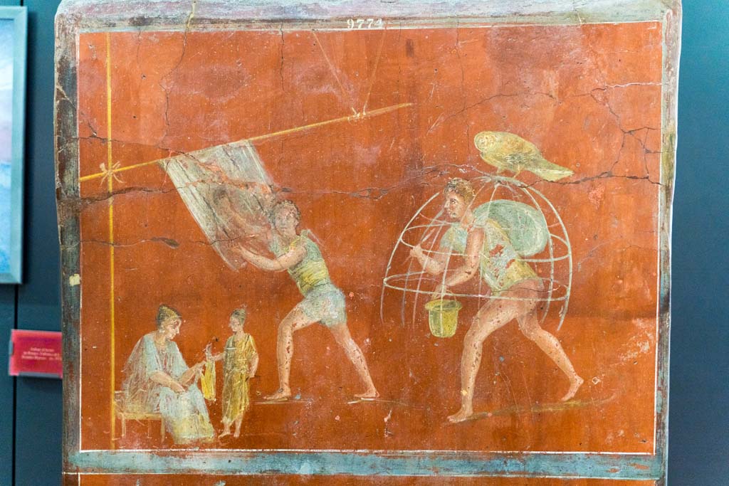 VI.8.20 Pompeii. July 2021. Detail from the pillar found in the Fullonica.  
Painting showing the inspection of the cloth, brushing the cloth to raise the nap and a bleaching frame. Photo courtesy of Johannes Eber.
Now in Naples Archaeological Museum. Inventory number 9974.
