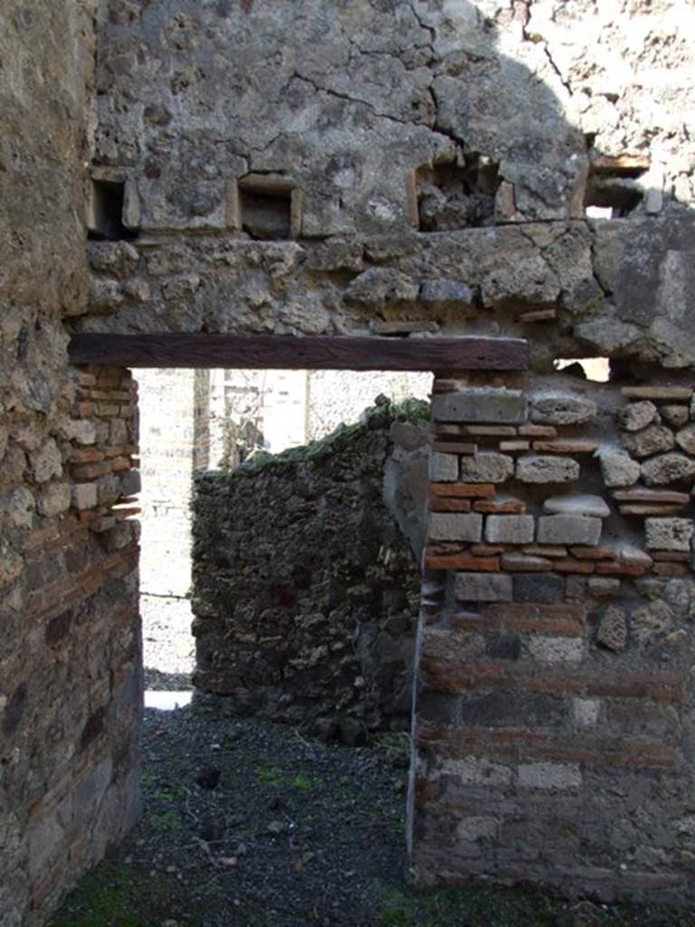 VI.8.20 Pompeii. March 2009.  Doorway on north wall of kitchen area.