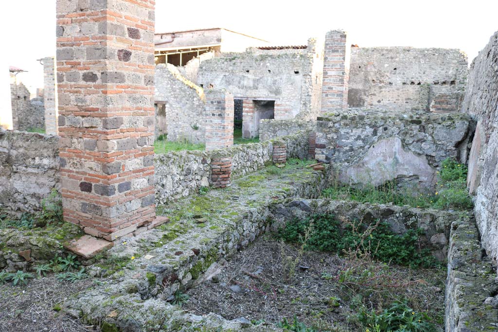 VI.8.20 Pompeii. December 2018. Looking south along vats on west portico. Photo courtesy of Aude Durand.