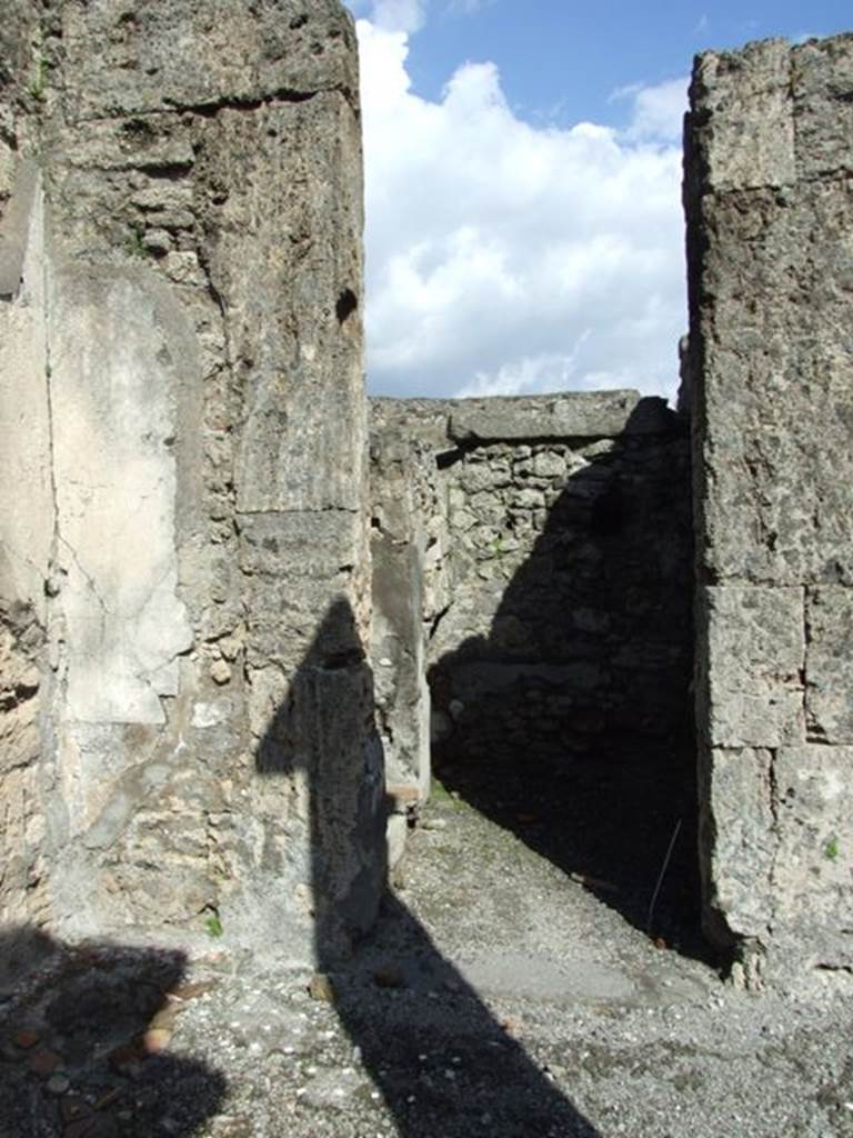 VI.8.21 Pompeii. March 2009. Doorway to room on north side of vestibule, with stairs to upper floor.
