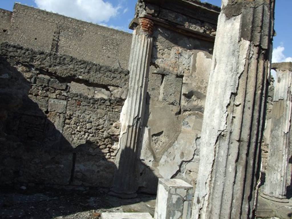 VI.8.21 Pompeii. March 2009. North side of atrium, showing the space between two pillars bricked in and plastered to form a wall of the exedra.