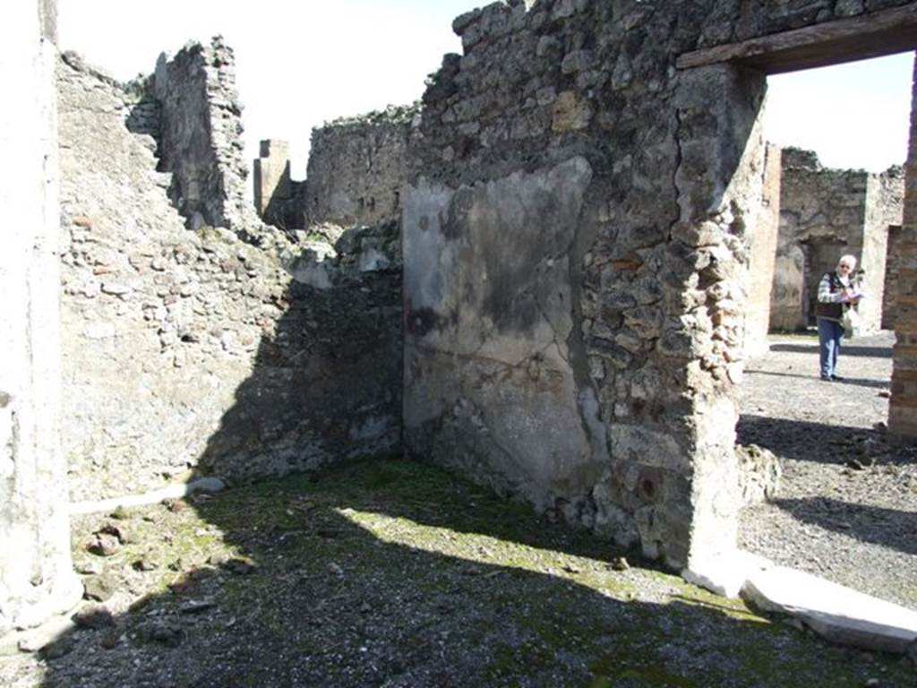 VI.8.21. Pompeii.  March 2009.  Area in south west corner of atrium, forming a room with doorway to peristyle of VI.8.20.