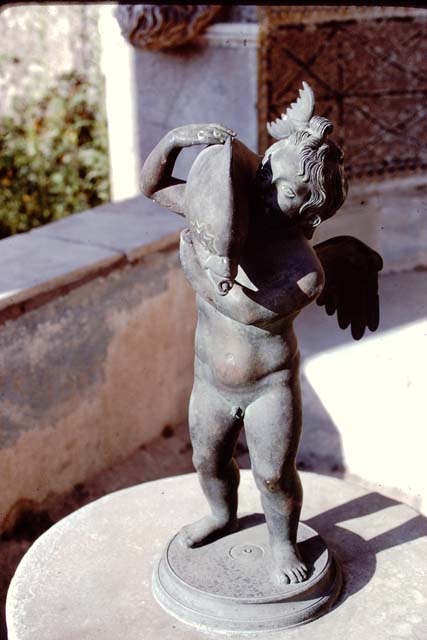 VI.8.22 Pompeii, June 2019. Looking west to large fountain, with statuette.
Photo courtesy of Buzz Ferebee.
