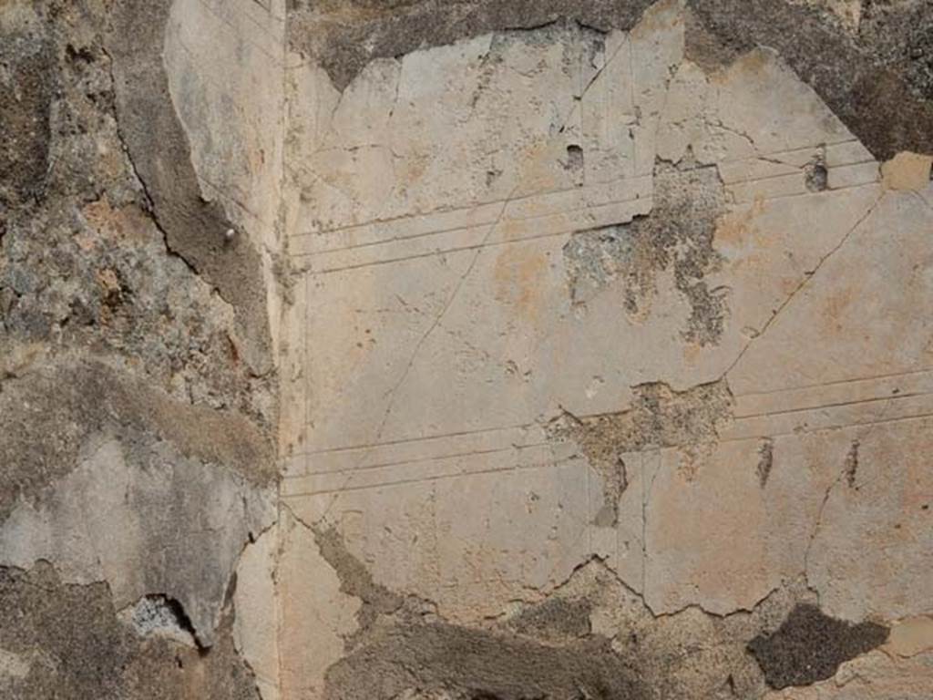 VI.8.22 Pompeii. May 2017. Room 18, detail from west end of north wall. Photo courtesy of Buzz Ferebee.


