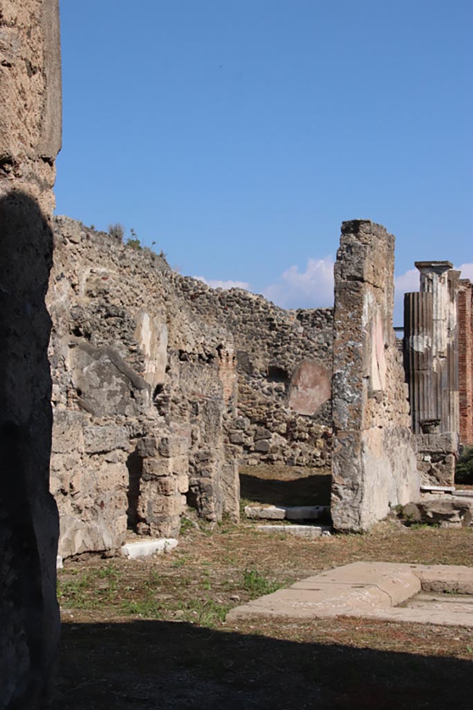 VI.9.3 Pompeii. April 2019. Looking east from entrance doorway. Photo courtesy of Rick Bauer.
According to Niccolini –
“No.3. The following are two houses communicating with each other, lived in perhaps by the same people. 
The entrance corridor of the first house was preceded by a vestibule and leaning against it to the left was an oecus, and to the right by a cubiculum containing a small cupboard/closet. In the right-hand wall of the tuscanic atrium we could see two doorways, of which one was bricked up and the other led into the following dwelling. 
On the left-hand side we found three cupboards/small storerooms, a repository and the masonry block used to support the domestic strong-box, near to where thirteen silver spoons were found.
At the rear of the atrium was the tablinum with an oecus on its left and a corridor on its right, leading to the garden area surrounded on two sides by columns joined between them by a masonry podium, in which was built a channel for the cultivation of flowers
To the left of the portico was a cubiculum, the stairs to the upper floor, the store-room and the kitchen, which also had a secondary rear doorway (at VI.9.12) on the eastern roadway.
On the east side was a triclinium, an exedra decorated with a painting of Venus and Aeneas, (see Helbig 1382), and finally a ruined room.”
See Niccolini, vol.2, 1862, p.35
