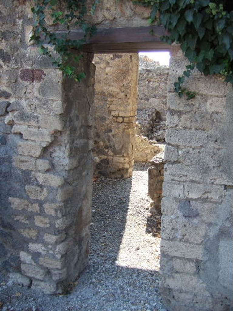 VI.9.12 Pompeii. September 2005. Entrance doorway.