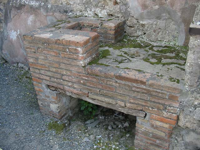VI.10.1 Pompeii. December 2018. 
Looking north-east across counter in bar-room towards doorway to rear room. Photo courtesy of Aude Durand.
