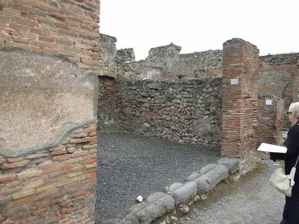 VI.10.13 Pompeii. May 2010. East wall of shop.