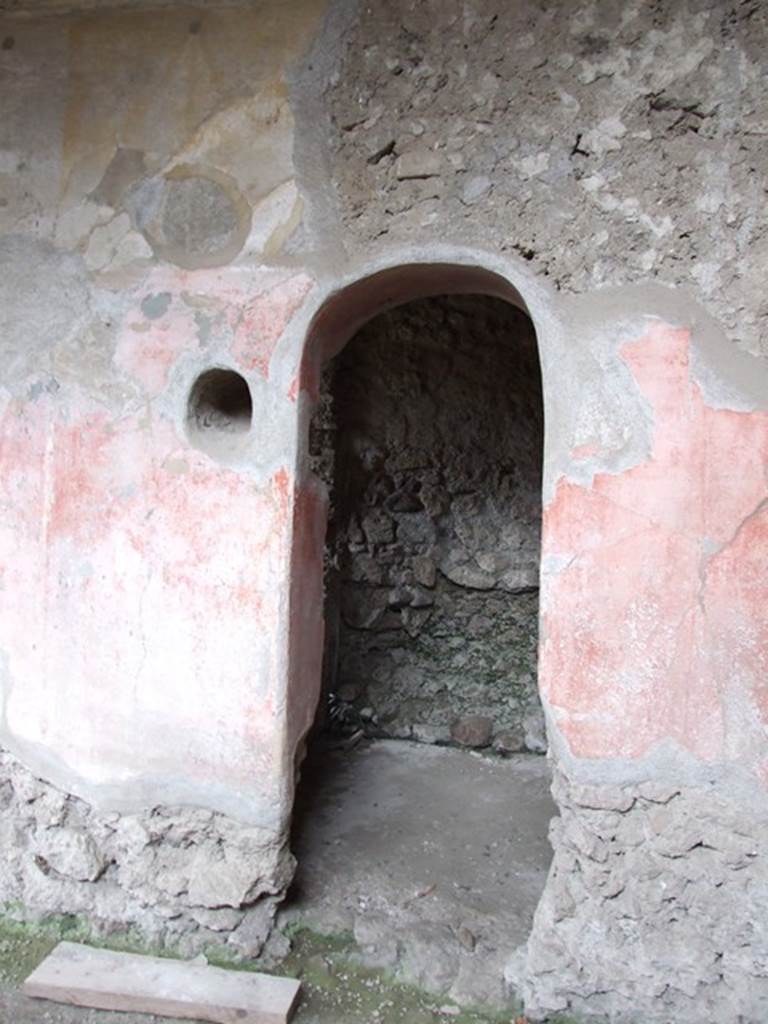 VI.11.9 Pompeii. December 2006. 
Room 41, arched doorway in east wall leading into small room 42 under the stairs off apodyterium.

