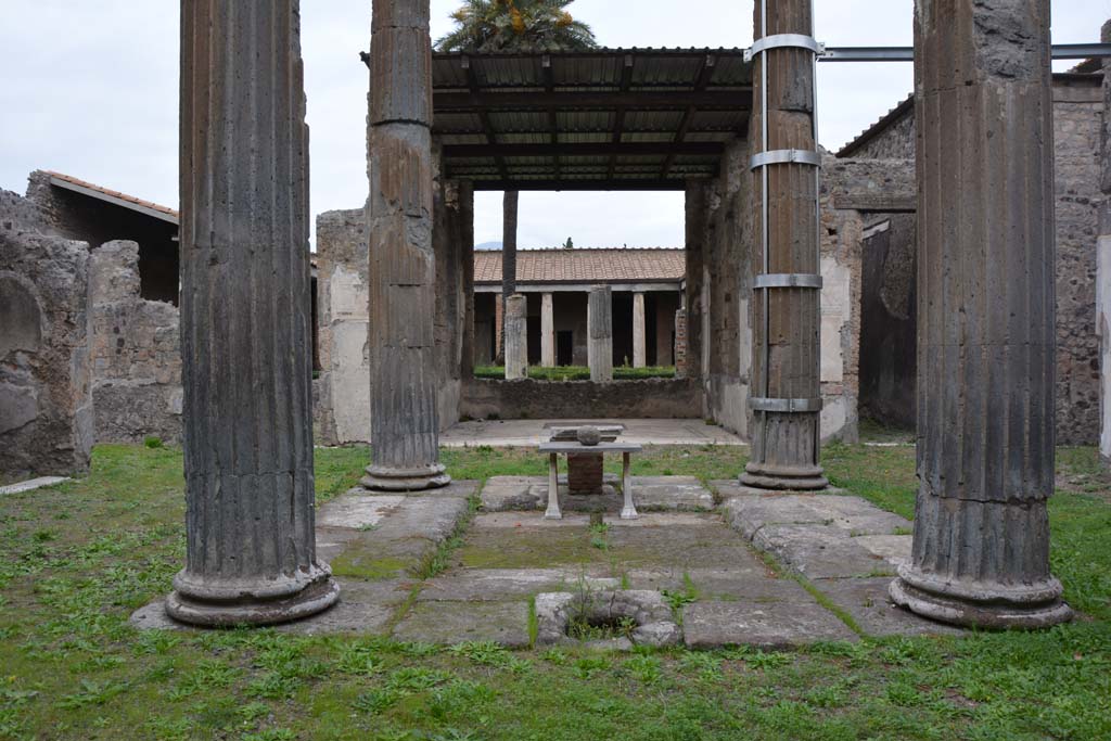 VI.11.10 Pompeii, 1978. Looking north across impluvium in atrium towards tablinum and peristyle. Photo by Stanley A. Jashemski.   
Source: The Wilhelmina and Stanley A. Jashemski archive in the University of Maryland Library, Special Collections (See collection page) and made available under the Creative Commons Attribution-Non Commercial License v.4. See Licence and use details. J78f0185
