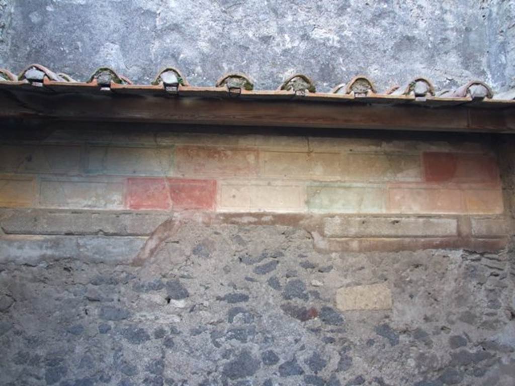 VI.11.10 Pompeii. May 2006. Room 24, looking towards north-west corner with detail of Style I, multicoloured stucco bricks.