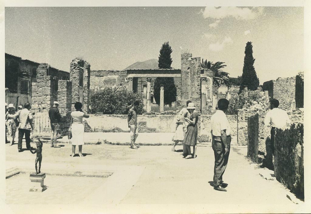 VI.12.2 Pompeii. 22nd July 1961. Looking north across east side of atrium. Photo courtesy of Rick Bauer.