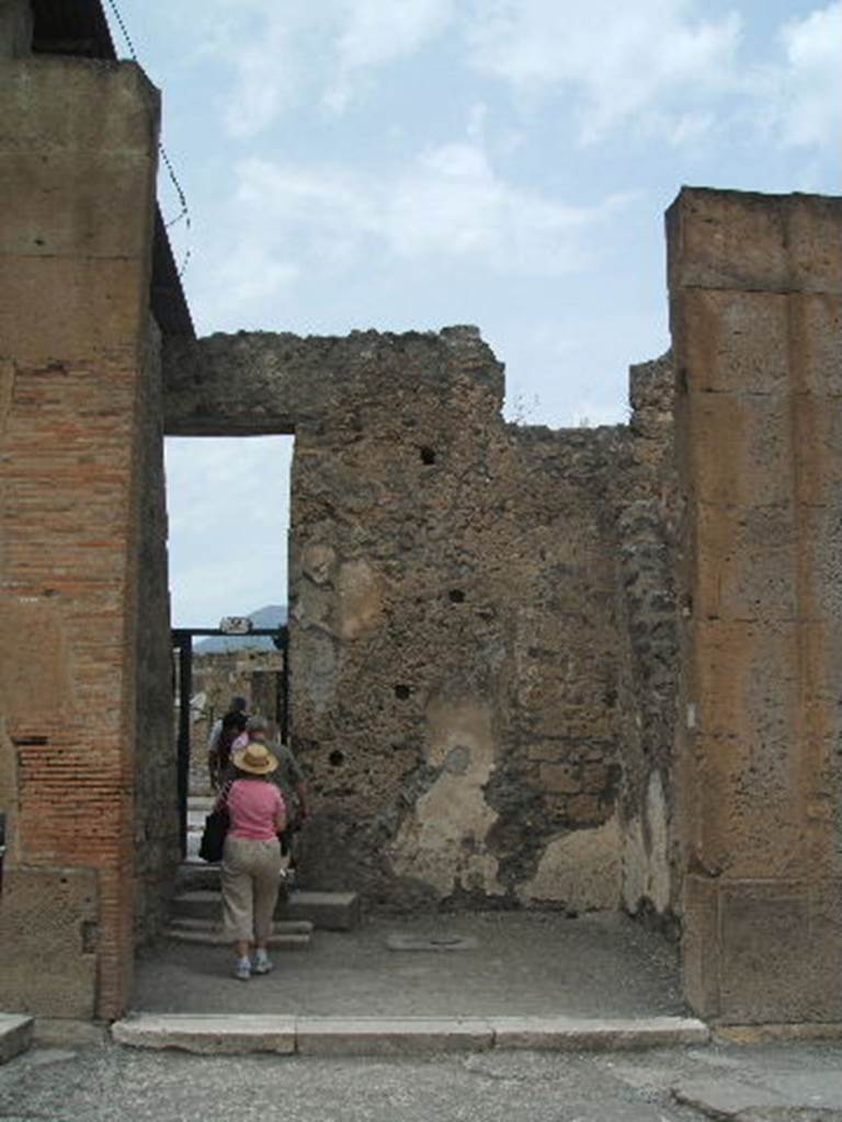 VI.12.3 Pompeii. May 2005. Looking north to shop entrance, with doorway in north wall to atrium of VI.12.2.
