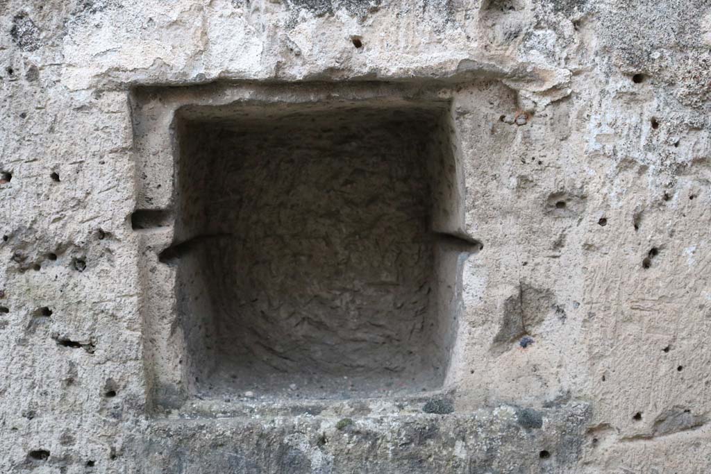 VI.12.4 Pompeii. December 2018. Rectangular niche in south wall of shop. Photo courtesy of Aude Durand.