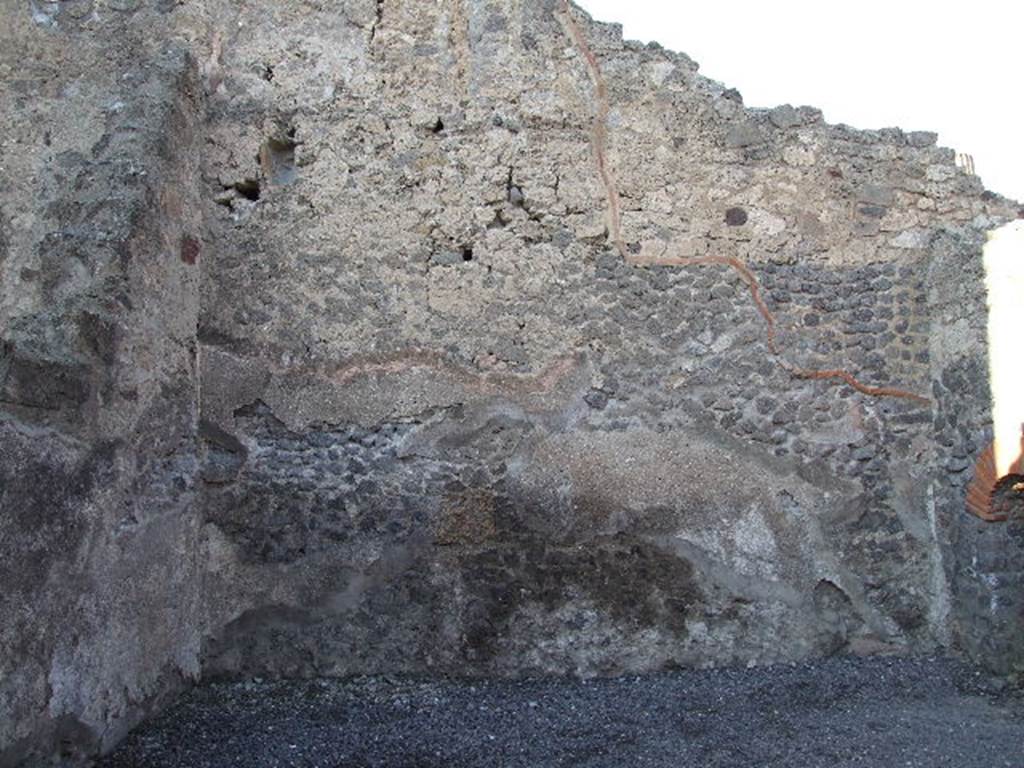 VI.12.4 Pompeii. December 2006. North wall of shop.