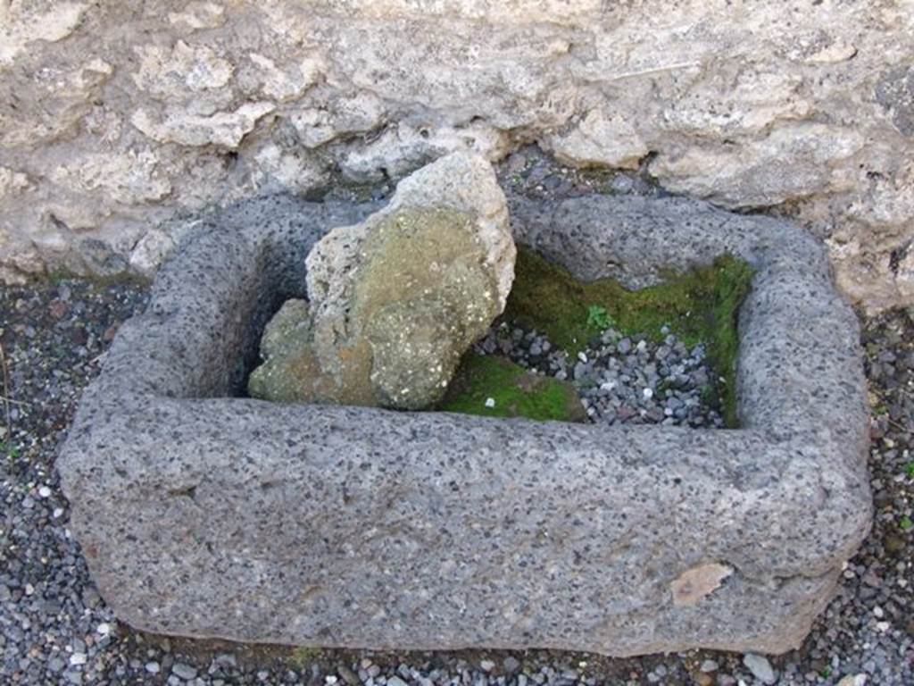 VI.13.7 Small lava tub or basin on west wall.
