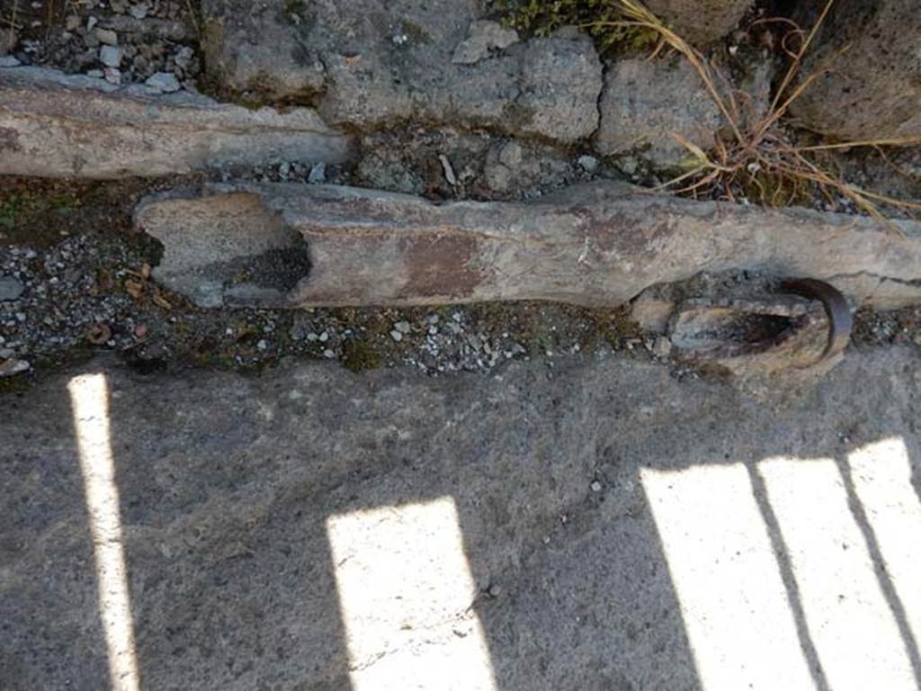 VI.13.13 Pompeii. May 2015. Detail of lead pipes in Vicolo dei Vettii. Photo courtesy of Buzz Ferebee.
