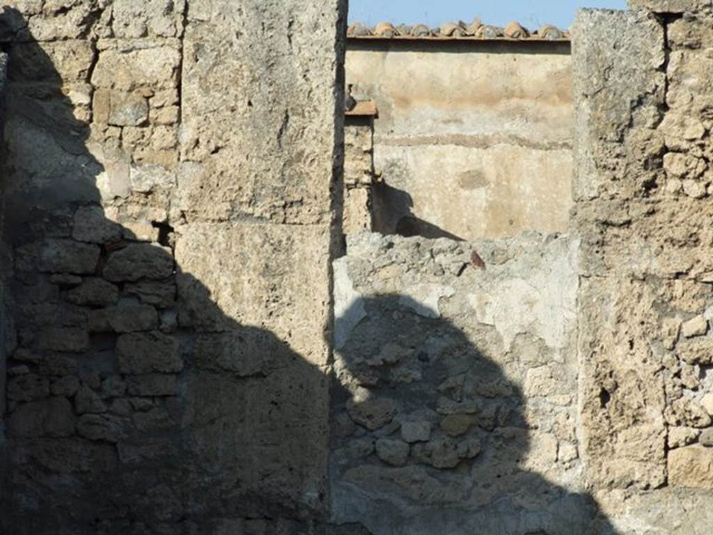 VI.14.2 Pompeii. December 2007. Blocked doorway in north wall of tablinum.