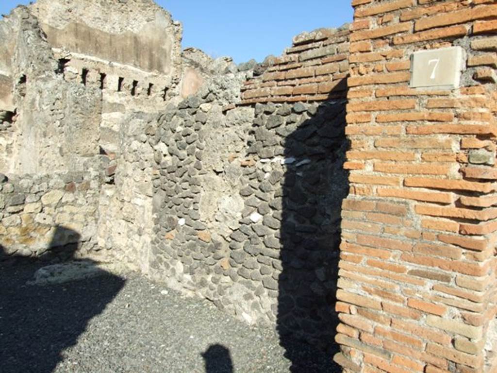 VI.14.7 Pompeii. December 2007. East wall, with base of steps to upper floor in north-east corner.
