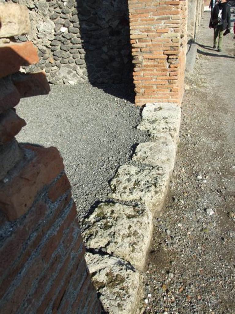 VI.14.7 Pompeii. December 2007. Stone threshold or sill at front of shop