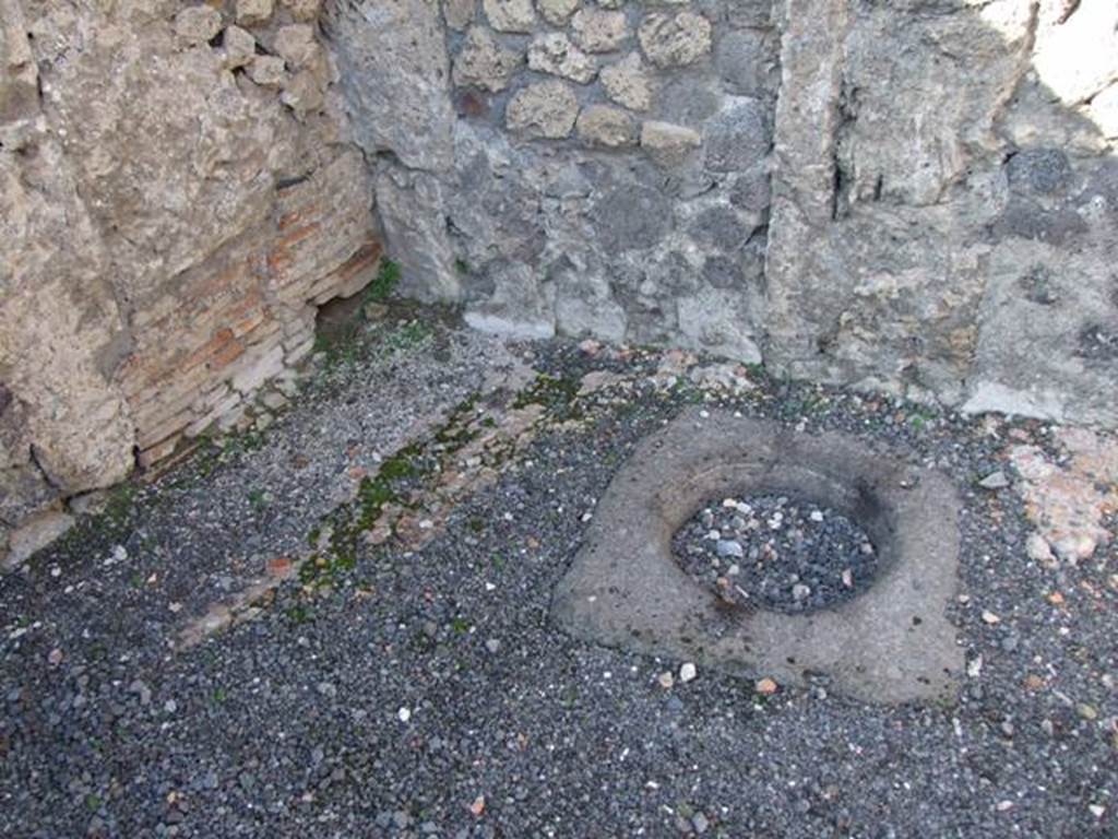VI.14.10 Pompeii. December 2007. Cistern mouth in north-west corner near north wall.