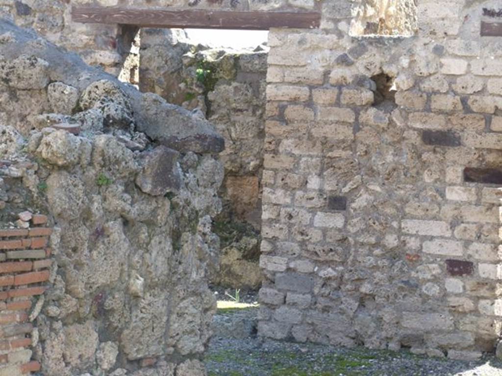 VI.14.18  Pompeii.  March 2009.  Room on south side, and corridor leading to VI.14.18. Taken from atrium of VI.14.20.