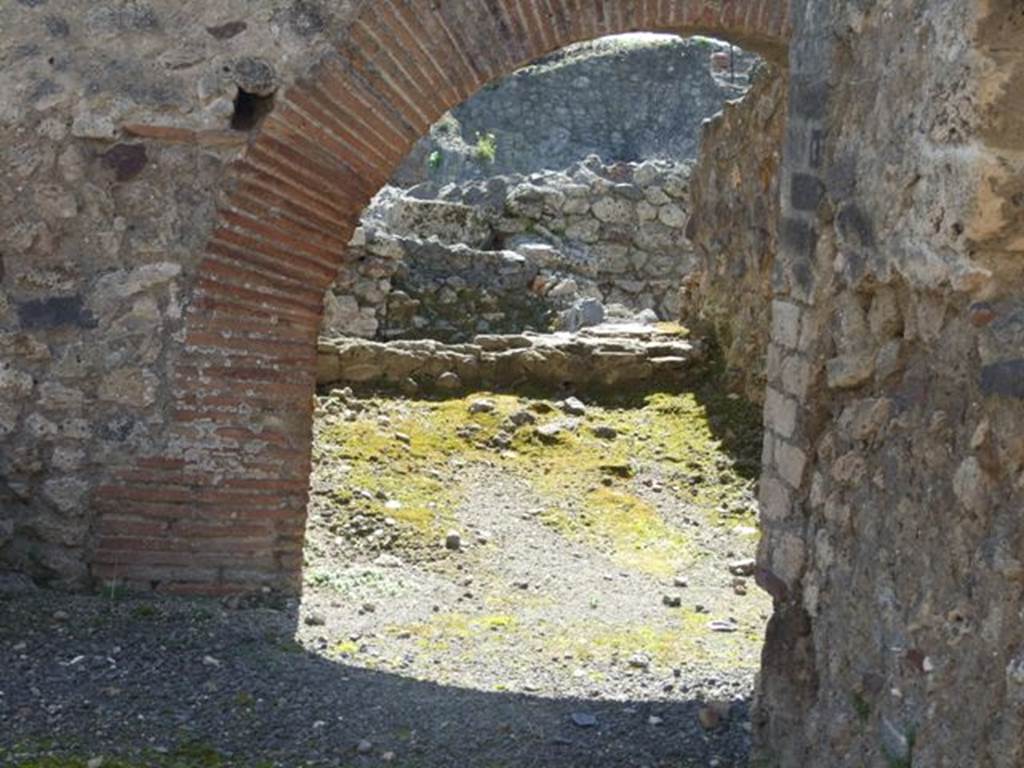 VI.14.18  Pompeii. March 2009. Arch in south-west corner, taken from atrium of VI.14.20.