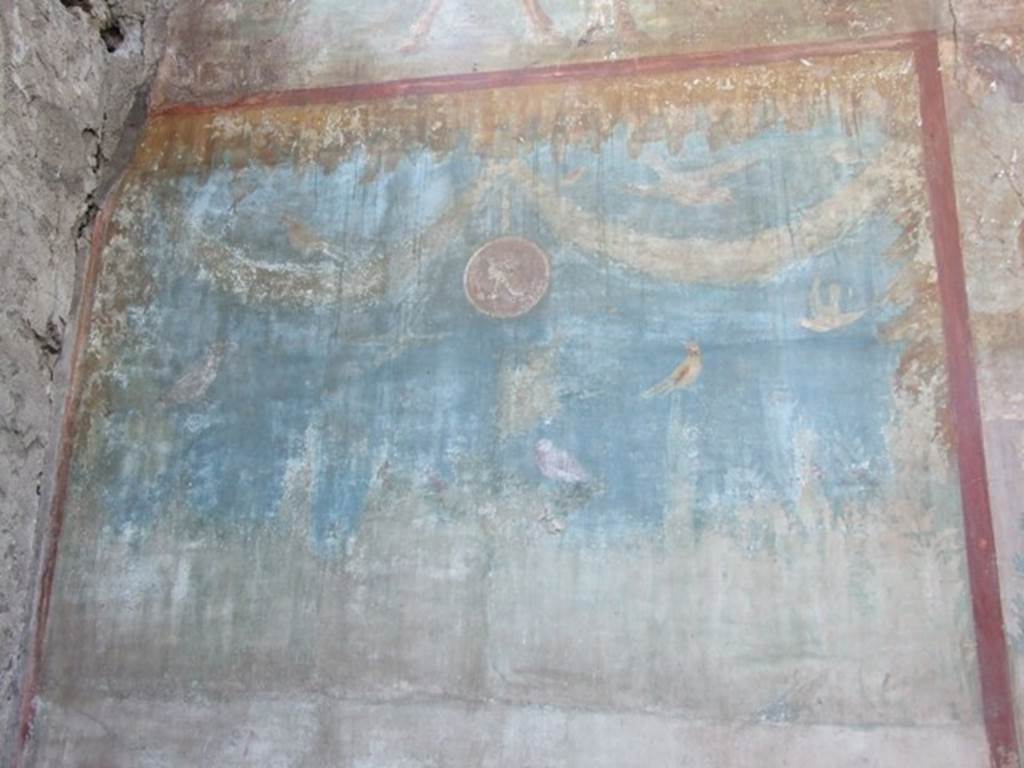 VI.14.20 Pompeii. March 2009. Room 18, painting of garlands and birds from middle section of south end of west wall of garden area.  