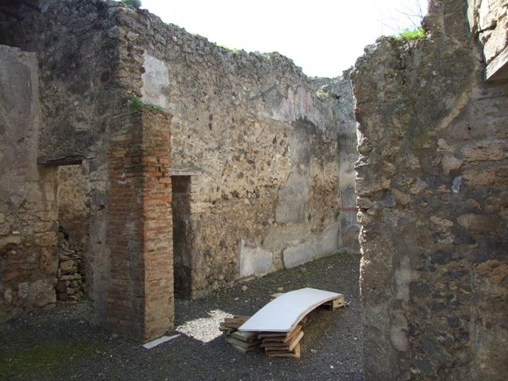 VI.14.20 Pompeii. March 2009. Doorway to room 15, triclinium. Looking west from area of west portico.