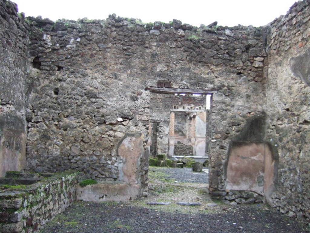 VI.14.21 Pompeii. December 2005.  Looking west through doorway to Fullonica at VI.14.22.
