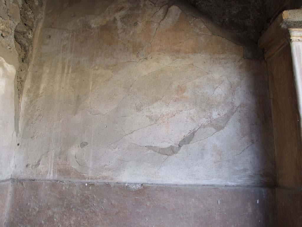 VI.14.22 Pompeii. December 2007. Room 12, west wall with remains of wall painting with figure.