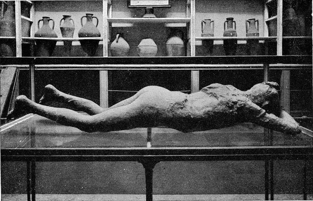 Pompei Antiquarium. About 1892. Cast of woman with her tunic raised over her head. Found 23rd April 1875 in NE corner of VI.14 in middle of Via Stabiana.