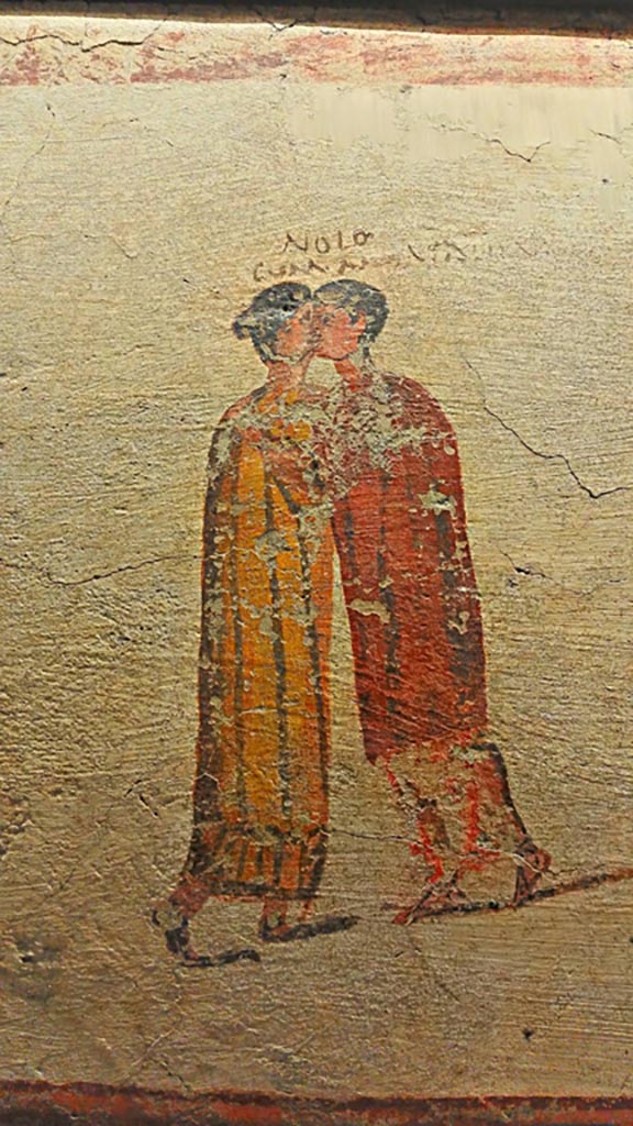 VI.14.35/36 Pompeii. May 2003. Fresco of a scene of drinkers, from the north wall. Photo courtesy of Nicolas Monteix.  Now in Naples Archaeological Museum.  Inventory number 111482.
According to Berry, a man calls to a bar maid “Over here” and another man on the right says “No its mine” and the bar maid says 
“Whoever wants it should take it.  Oceanus come here and drink”.
See Berry, J., 2007. The Complete Pompeii. London, Thames & Hudson, (p.231-2)

According to Epigraphik-Datenbank Clauss/Slaby (See www.manfredclauss.de), this is part of CIL IV 3494;

Hoc

Non
mia est

Qui vol(et)
Sumat
Oceane
veni bibe //      [CIL IV 3494 part]
