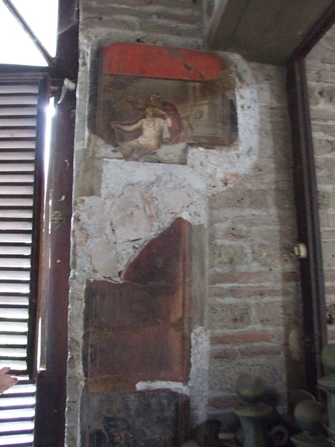 VI.15.1 Pompeii.  December 2006. Room of the Cupids or Cherubs.   Wall plaque
