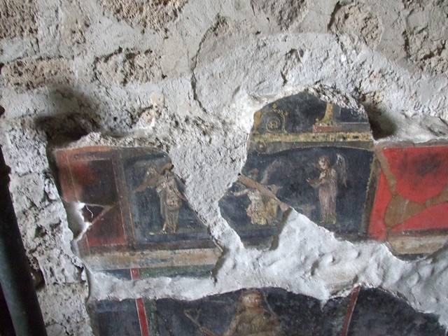 VI.15.1 Pompeii.  December 2006.  Room of the Cupids or Cherubs.   
Painting of Cupids buying and selling wine

