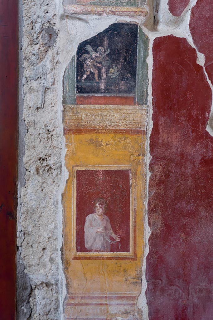 VI.15.1 Pompeii. May 2017. Detail of painted panel on west wall of north ala. Photo courtesy of Buzz Ferebee.
