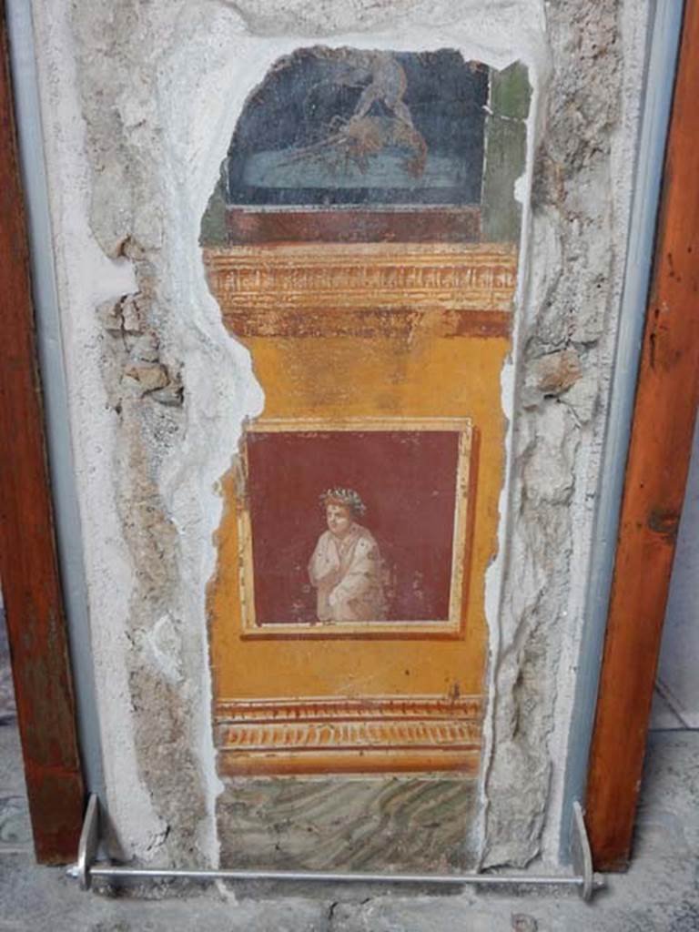 VI.15.1 Pompeii. May 2017. Detail of painting in atrium and doorway to bedroom on left of main entrance. Photo courtesy of Buzz Ferebee.
