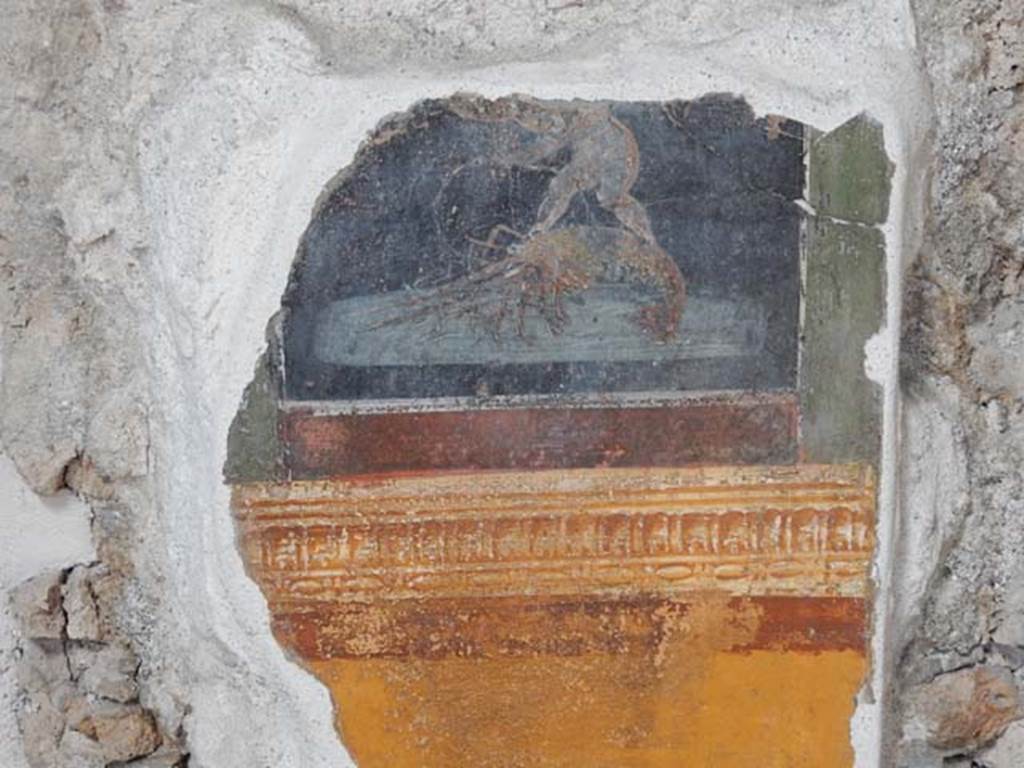 VI.15.1 Pompeii. May 2017.  Detail of painting in atrium between doorways to bedroom on left of main entrance and oecus on south side, after restoration. Photo courtesy of Buzz Ferebee.
