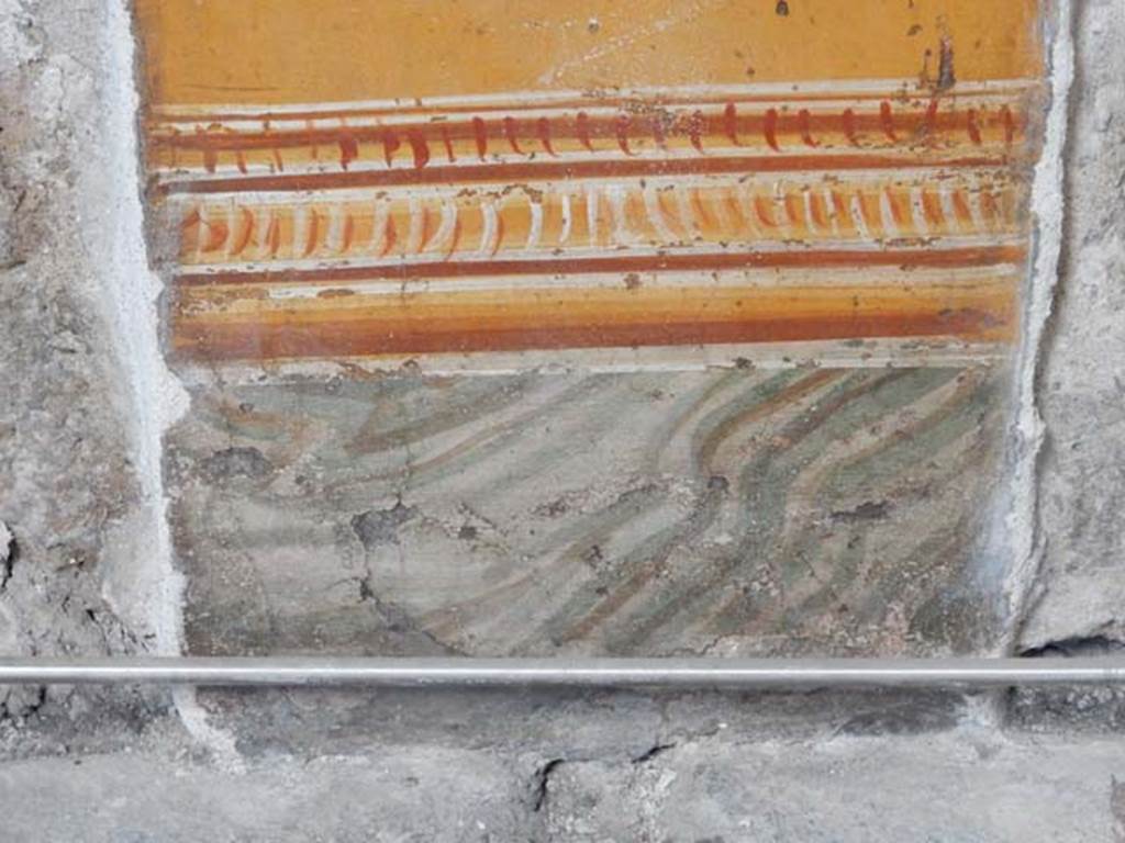 VI.15.1 Pompeii. May 2017.  Detail of painting in atrium between doorways to bedroom on left of main entrance and oecus on south side, after restoration.
Photo courtesy of Buzz Ferebee.
