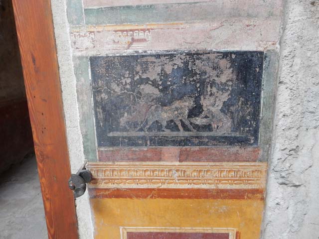 VI.15.1 Pompeii. December 2006. Detail of painted panel from east wall in ala on south side of atrium.