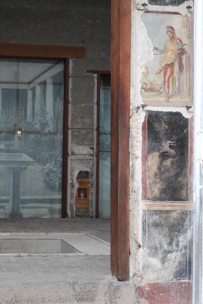VI.15.1 Pompeii. May 2017. Painting of a bearded Priapus in vestibule, after renovation. Photo courtesy of Buzz Ferebee.
