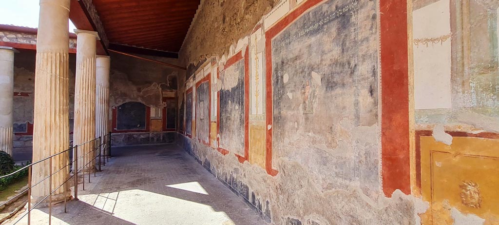 VI.15.1 Pompeii. April 2023. Looking south along west portico. Photo courtesy of Giuseppe Ciaramella.