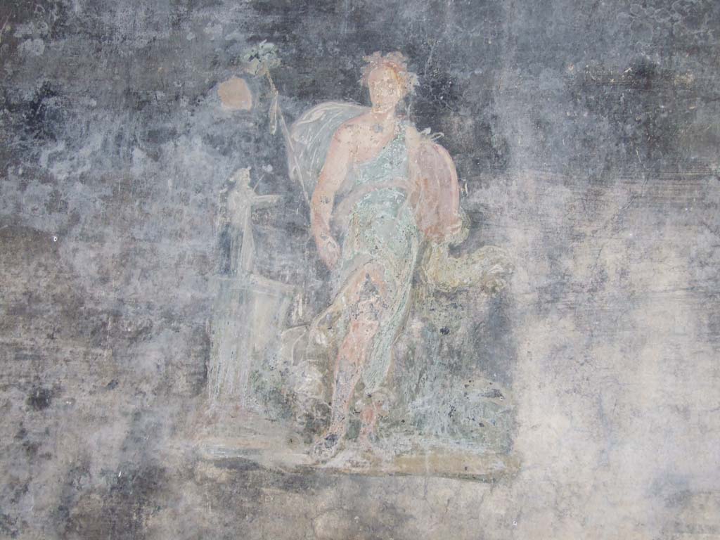 VI.15.1 Pompeii. December 2006. Painting of figure from west wall of peristyle.
