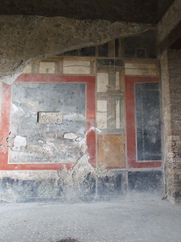 VI.15.1 Pompeii. December 2006. West wall of peristyle, in north-west corner.